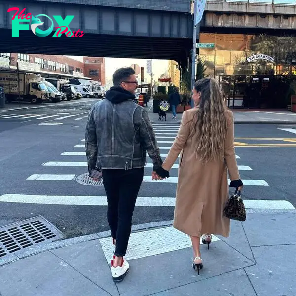 Jax Taylor and Brittany Cartwright holding hands