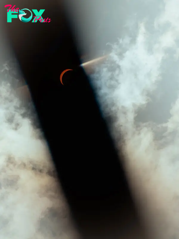 Solar eclipse viewing at Main Street Garden Park in Dallas, Texas.