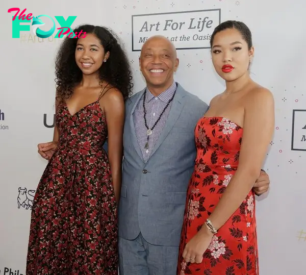 Russell Simmons with his daughters