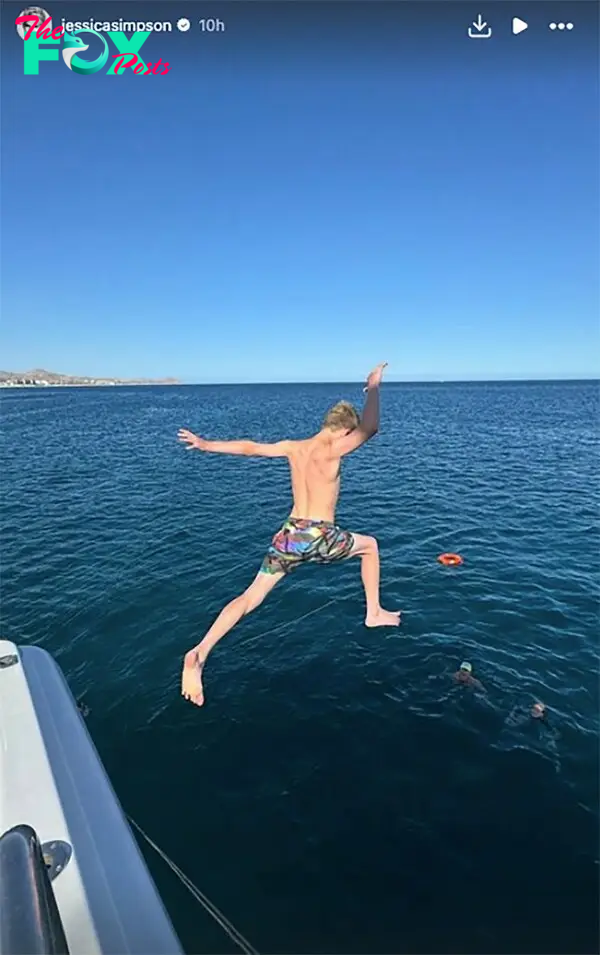 Ace jumping off a yacht into the water. 