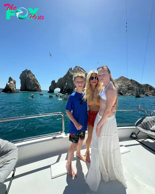 Jessica Simpson and Ace and Maxwell on a boat. 