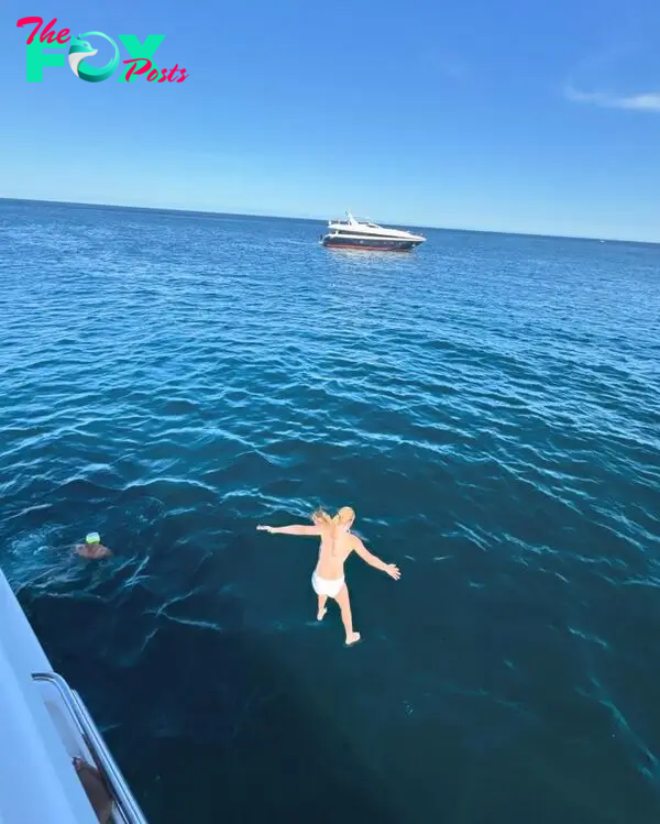 Maxwell jumping into the water in Cabo San Lucas, Mexico.  