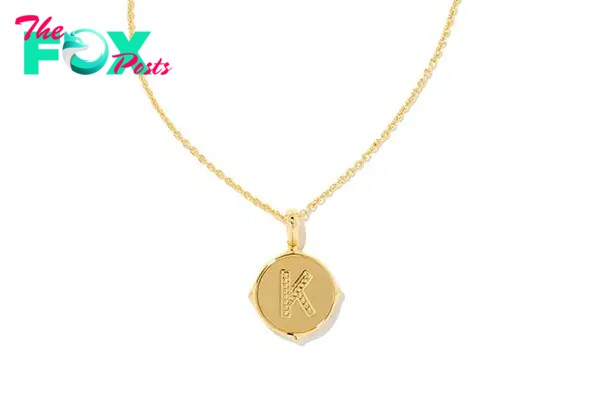 A gold "K" letter pendant necklace