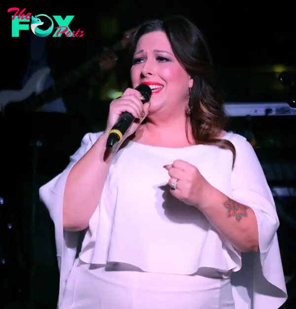 Carnie Wilson in white dress performing in California. 