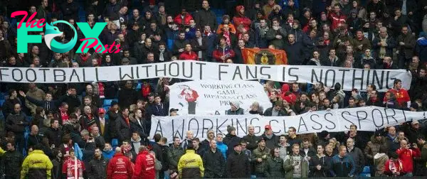 MANCHESTER, ENGLAND - Sunday, February 3, 2013: Liverpool fans protest against high ticket prices with banners 'A Working Class Sport?', 'Football Without Fans Is Nothing' during the Premiership match against Manchester City at the City of Manchester Stadium. (Pic by David Rawcliffe/Propaganda)