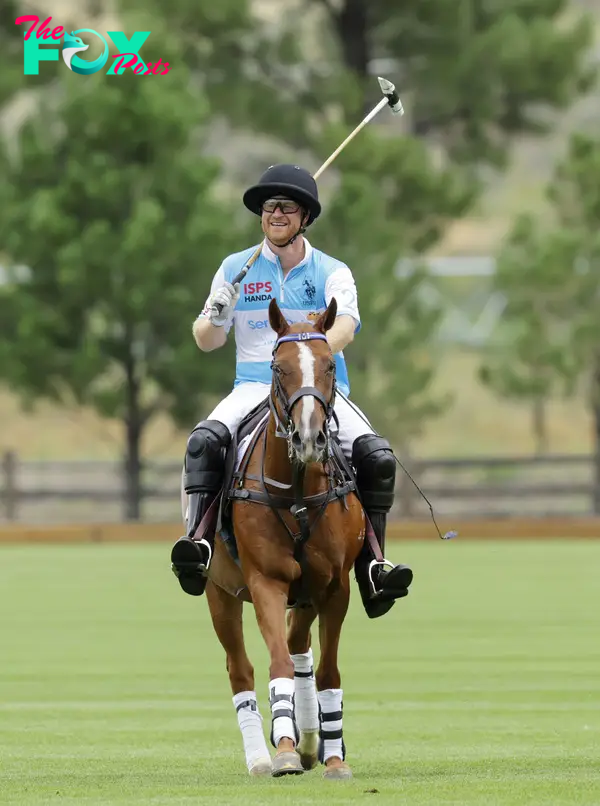Prince Harry playing polo.