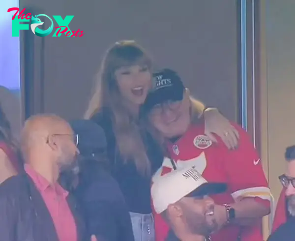 Taylor Swift hugging Donna Kelce.