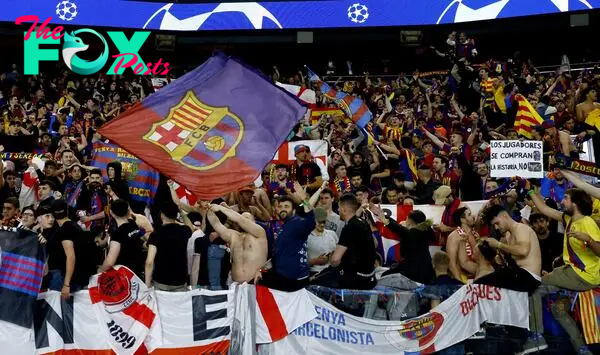 Fans of Barcelona celebrate at the end of the UEFA Champions League quarter-finals, 1st leg soccer match between Paris Saint-Germain and FC Barcelona