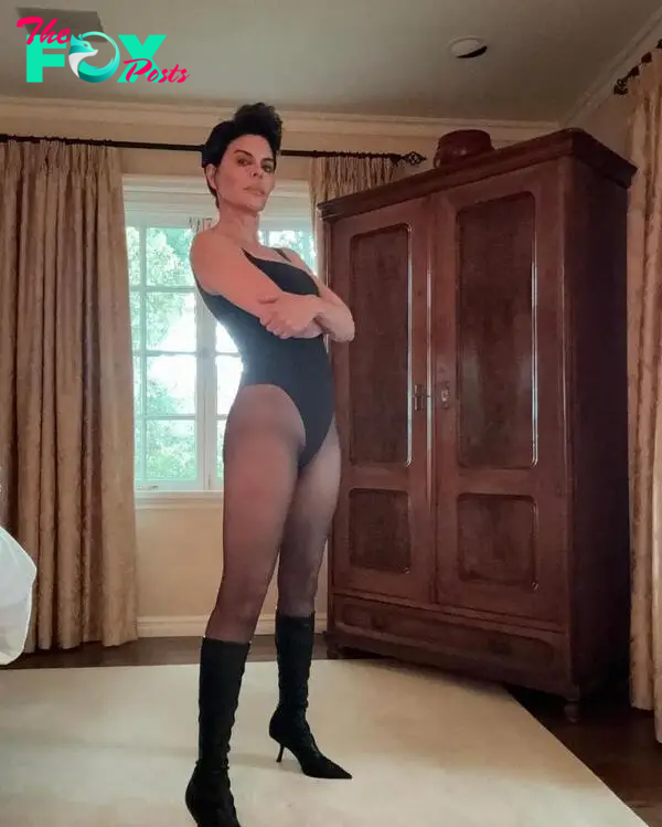 Lisa Rinna in a black leotard and tights.
