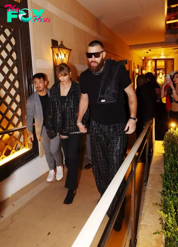 Taylor Swift and Travis Kelce holding hands in Las Vegas. 