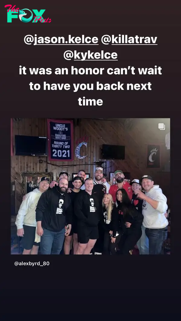 Jason and Travis Kelce at a bar with fans.