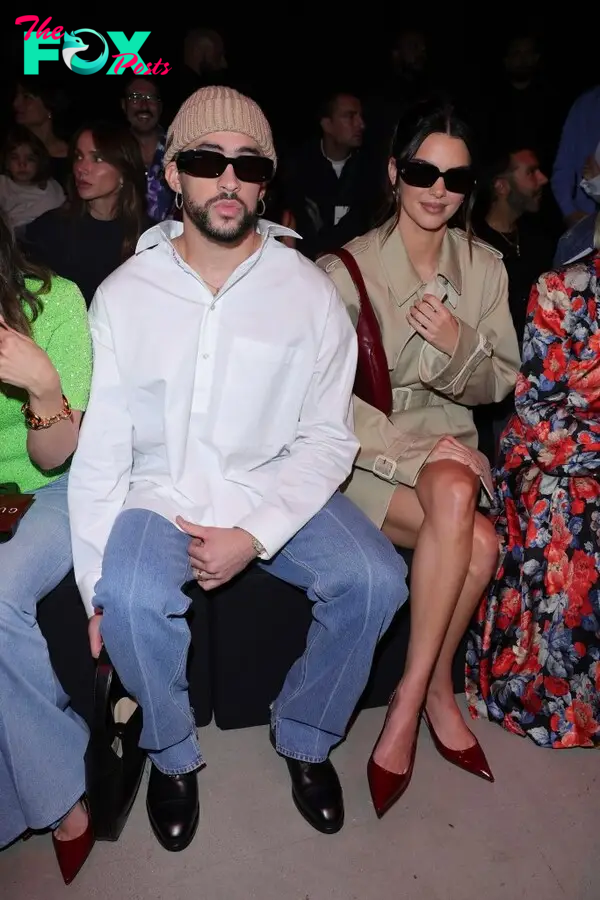 Bad bunny and Kendall Jenner at a fashion show in 2023.