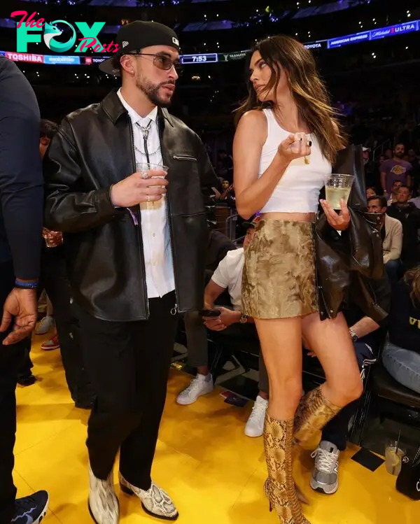 Bad bunny and Kendall Jenner at an NBA game.
