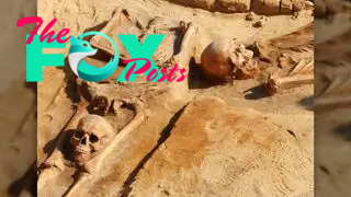 This photo shows a decapitated burial with the head placed by the legs.