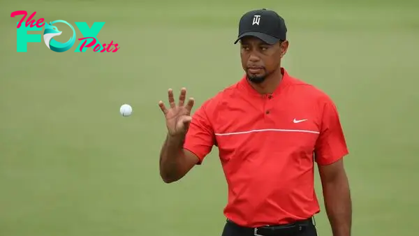 Here’s why you’ll always see Woods wear red on Sunday.