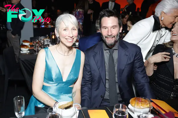 Alexandra Grant and Keanu Reeves sitting together 