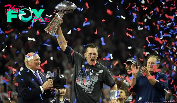 Tom Brady holds the Vince Lombardi Trophy after defeating the Atlanta Falcons 34-28 in overtime during Super Bowl 51.