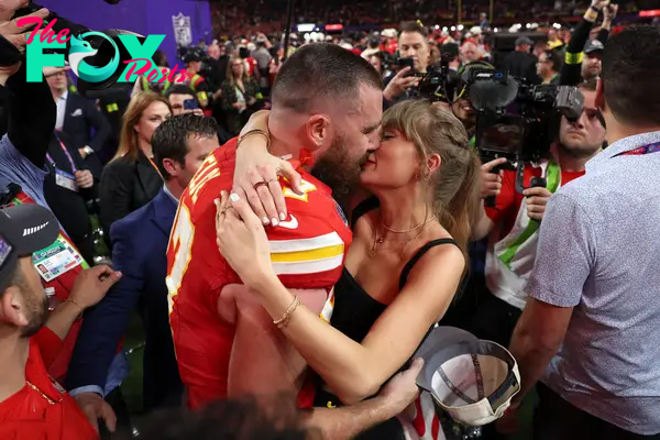 Travis Kelce #87 of the Kansas City Chiefs kisses Taylor Swift after defeating the San Francisco 49ers 2 during Super Bowl LVIII at Allegiant Stadium on February 11, 2024 in Las Vegas, Nevada.