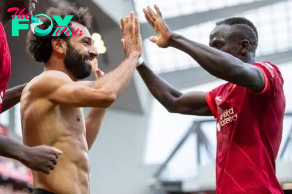 LIVERPOOL, ENGLAND - Saturday, September 18, 2021: Liverpool's Mohamed Salah (C) celebrates with team-mates Ibrahima Konaté (L) and Sadio Mané (R) after scoring the second goal, his 101st in the Premier League, during the FA Premier League match between Liverpool FC and Crystal Palace FC at Anfield. Liverpool won 3-0. (Pic by David Rawcliffe/Propaganda)