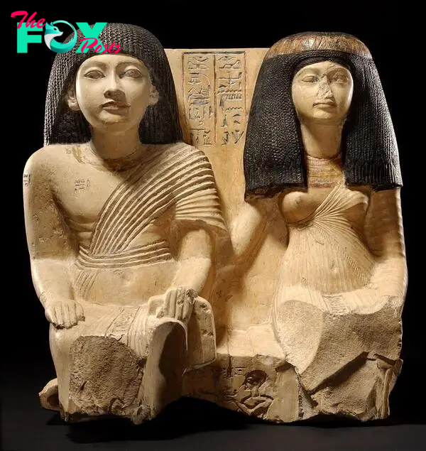 Double seated statuette of Kinebu and Isis. August Kestner Museum