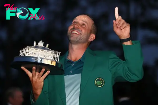 AUGUSTA, GA - APRIL 09: Sergio Garcia of Spain celebrates with the Masters Trophy during the Green Jacket ceremony