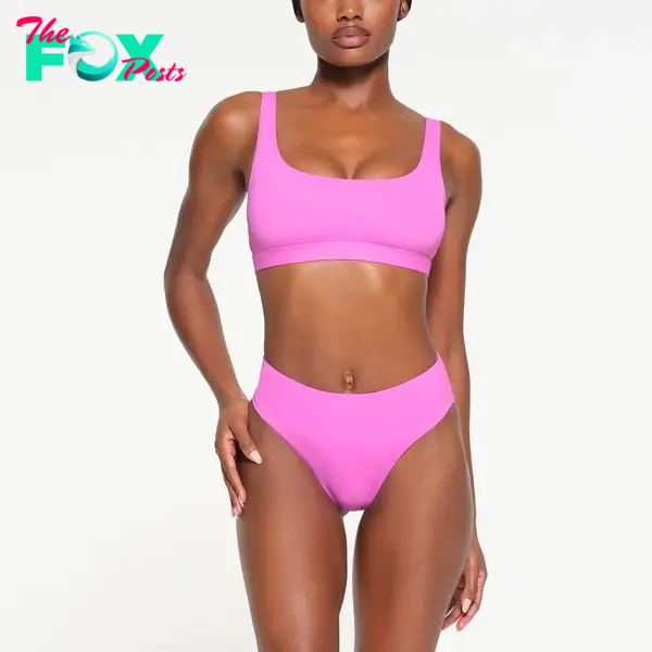 A model in a pink bikini
