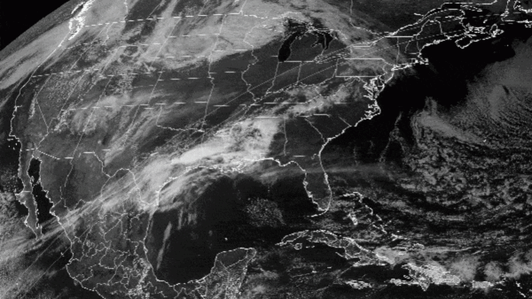 Looped video footage of a large shadow moving across North America