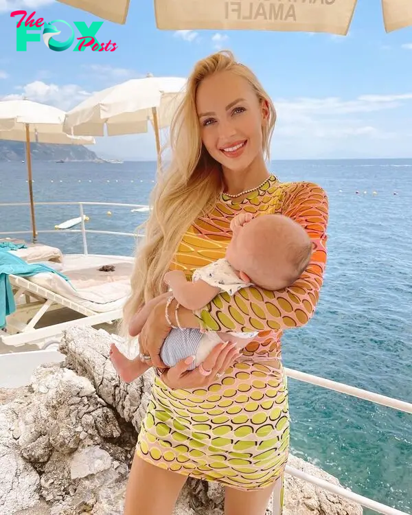 Christine Quinn holding her baby.