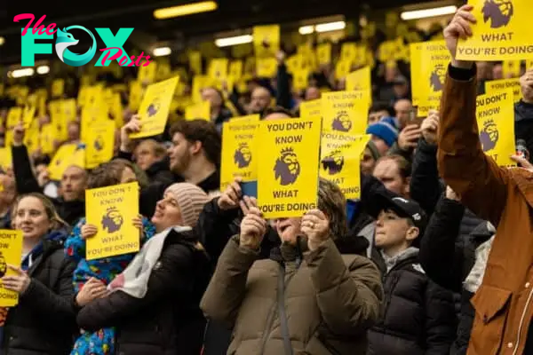 LIVERPOOL, ENGLAND - Saturday, February 3, 2024: Everton fans hold up placards reading 'You Don't Know What You're Doing' aimed at the Premier League following their 10-point deduction. (Photo by David Rawcliffe/Propaganda)