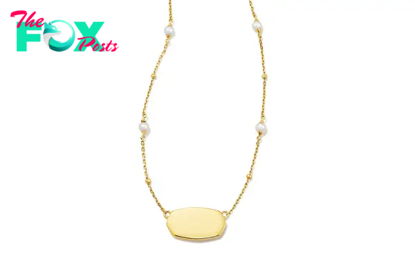 A pearl and gold Kendra Scott necklace
