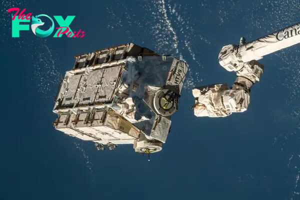 An external pallet packed with old nickel-hydrogen batteries is released from the Canadarm2 robotic arm as the International Space Station orbited 260 miles above the Pacific Ocean west of Central America.
