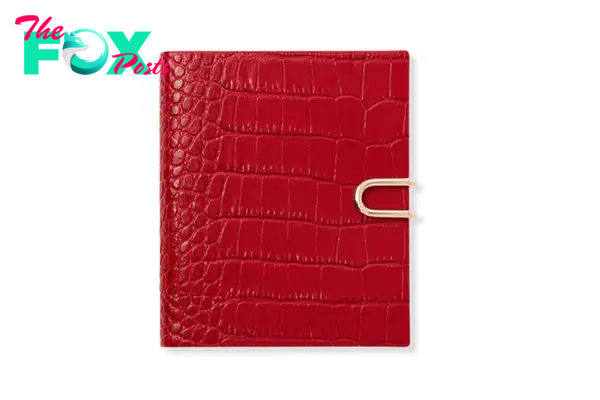 A red crocodile notebook