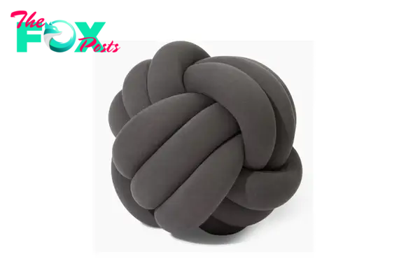A gray knotted pillow