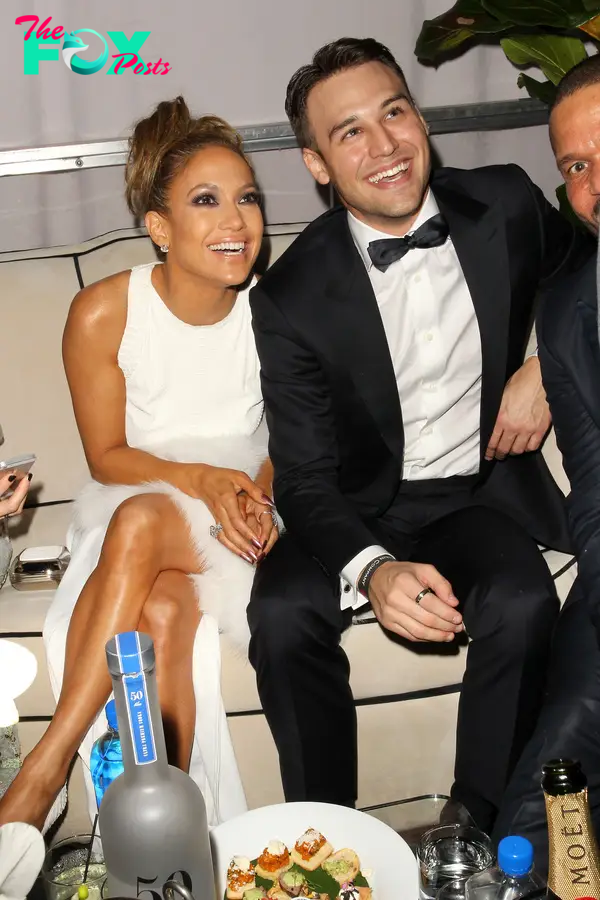 Jennifer Lopez and Ryan Guzman at a party.