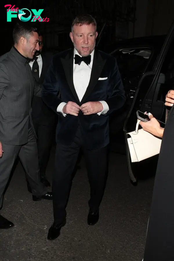 Guy Ritchie arriving at Victoria Beckham's 50th birthday party 