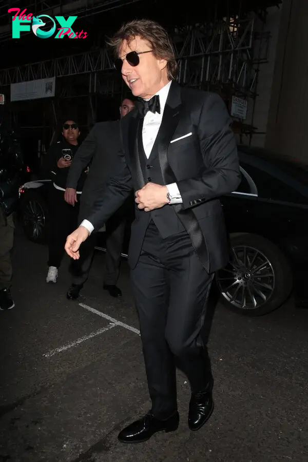 Tom Cruise arriving at Victoria Beckham's 50th birthday party 