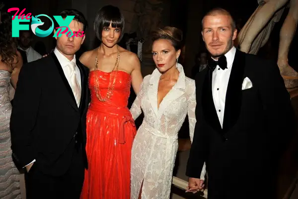 Tom Cruise, Katie Holmes pose with Victoria Beckham and David Beckham.