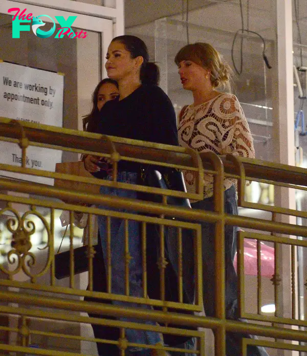 Longtime friends Selena Gomez and Taylor Swift leave sushi park together after a girls night out on the town!