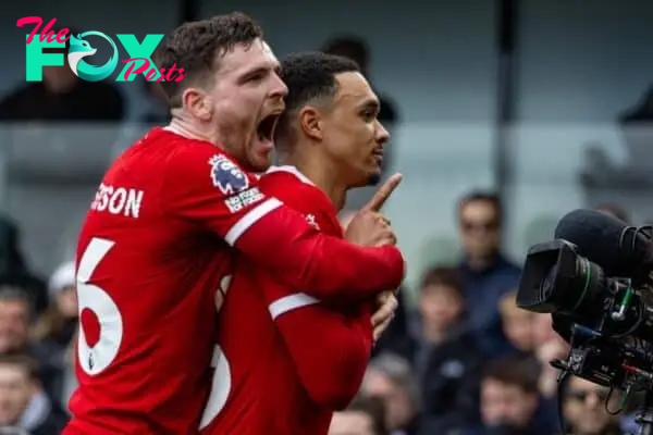 LONDON, ENGLAND - Sunday, April 21, 2024: Liverpool's Trent Alexander-Arnold (R) celebrates with team-mate Andy Robertson after scoring the first goal during the FA Premier League match between Fulham FC and Liverpool FC at Craven Cottage. (Photo by David Rawcliffe/Propaganda)