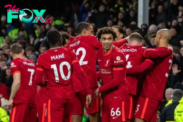 LIVERPOOL, ENGLAND - Wednesday, December 1, 2021: Liverpool's Diogo Jota (hidden) celebrates with team-mates after scoring the fourth goal during the FA Premier League match between Everton FC and Liverpool FC, the 239th Merseyside Derby, at Goodison Park. Liverpool won 4-1. (Pic by David Rawcliffe/Propaganda)