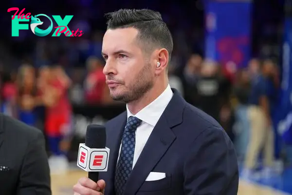 PHILADELPHIA, PA - MARCH 02: ESPN analyst JJ Redick looks on prior to the game between the New York Knicks and Philadelphia 76ers at the Wells Fargo Center on March 2, 2022 in Philadelphia, Pennsylvania. NOTE TO USER: User expressly acknowledges and agrees that, by downloading and or using this photograph, User is consenting to the terms and conditions of the Getty Images License Agreement. (Photo by Mitchell Leff/Getty Images)