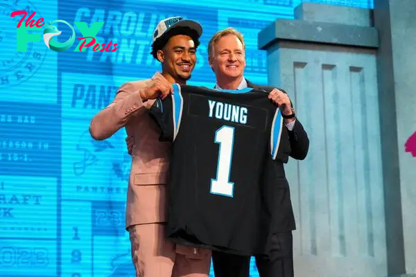 Alabama quarterback Bryce Young with NFL commissioner Roger Goodell after he was drafted first overall by the Carolina Panthers in the first round of the 2023 NFL Draft.