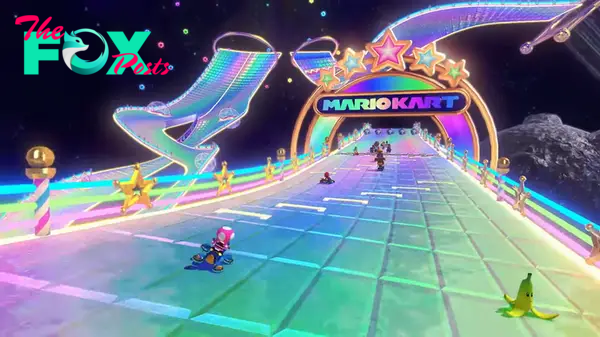Screenshot of Wii Rainbow Road from Mario Kart 8 Deluxe DLC with Toadette racing to finish line