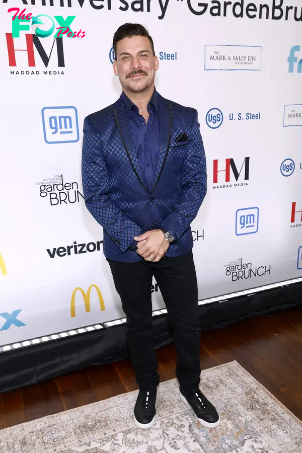 Jax Taylor in a blue blazer and black pants at the White House Correspondents' Garden Brunch in 2024.