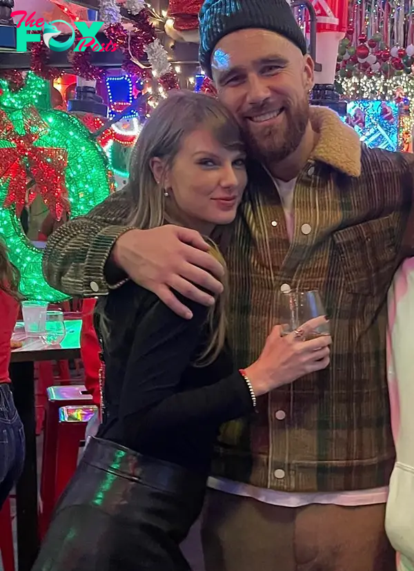 Taylor Swift and Travis Kelce at a party.