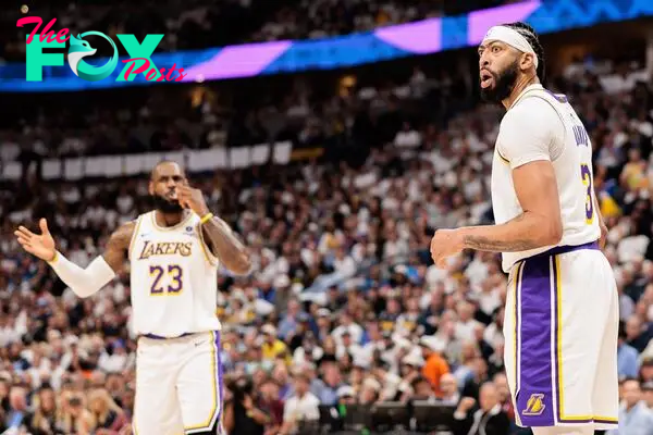 Apr 20, 2024; Denver, Colorado, USA; Los Angeles Lakers forward Anthony Davis (3) and  forward LeBron James (23) react during the first quarter against the Denver Nuggets in game one of the first round for the 2024 NBA playoffs at Ball Arena. Mandatory Credit: Andrew Wevers-USA TODAY Sports