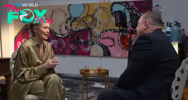 Sharon Stone getting interviewed.