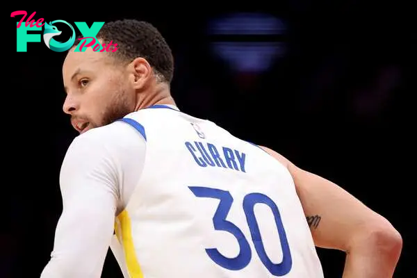 Stephen Curry #30 of the Golden State Warriors reacts during the second quarter against the Portland Trail Blazers at Moda Center on April 09, 2023 in Portland, Oregon.