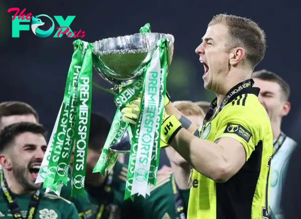 Joe Hart of Celtic celebrates with the Premier Sports Cup after victory in the Premier Sports Cup Final between Celtic and Hibernian at Hampden Par...