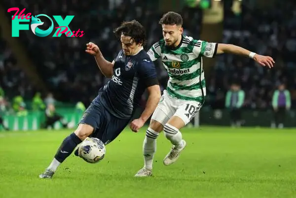 James Brown of Celtic vies with Nicolas Kuhn of Celtic during the Cinch Scottish Premiership match between Celtic FC and Ross County FC at Celtic P...